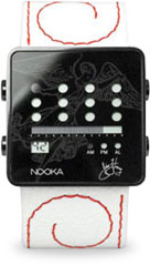 The limited edition Fluevog/Nooka Timepiece watch featured a white Italian leather band with red swirl stitching.