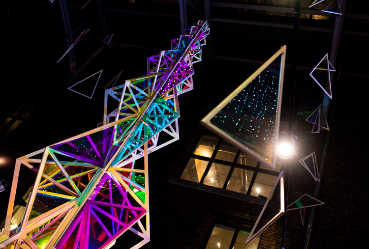 25 foot tall multichromatic Christmas tree on display at Fluevog Gastown