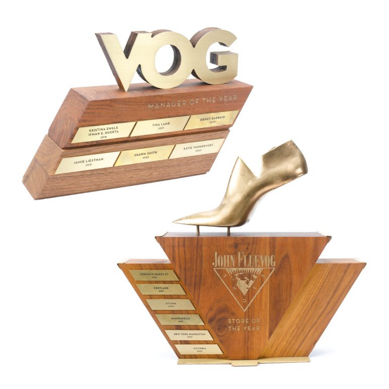 The Fluevogologist's Choice Awards trophies for Manager of the Year and Store of the Year.